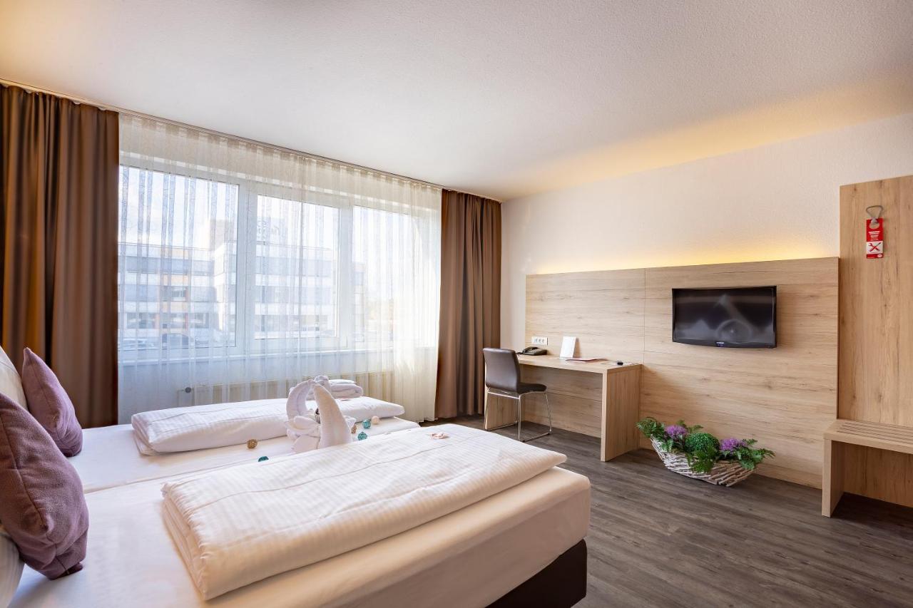 Michel Hotel Frankfurt Airport Rüsselsheim Eksteriør billede